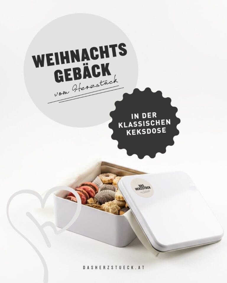 Weihnachtsgebäck vom Herzstück in der klassischen weißen Keksdose